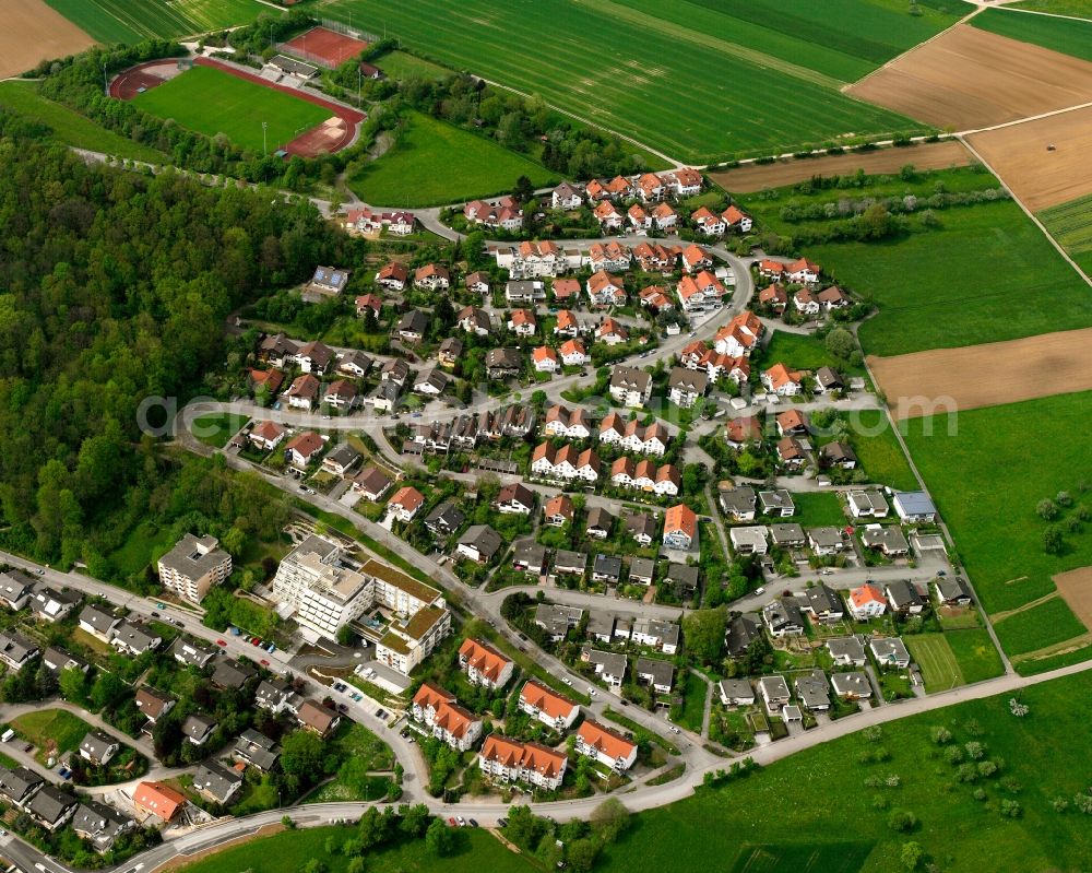 Uhingen from the bird's eye view: Agricultural land and field boundaries surround the settlement area of the village in Uhingen in the state Baden-Wuerttemberg, Germany