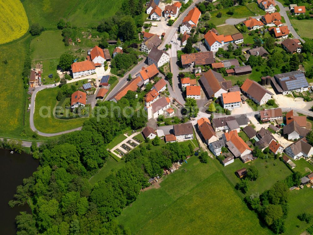 Aerial photograph Uigendorf - Agricultural land and field boundaries surround the settlement area of the village in Uigendorf in the state Baden-Wuerttemberg, Germany