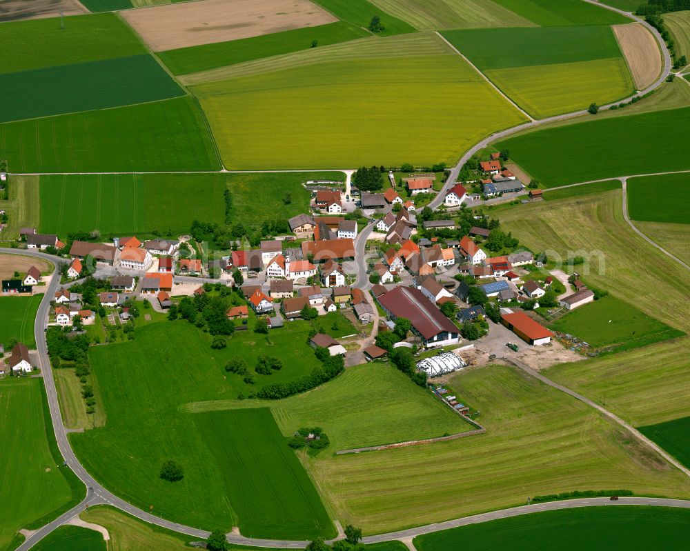 Unlingen from the bird's eye view: Agricultural land and field boundaries surround the settlement area of the village in Unlingen in the state Baden-Wuerttemberg, Germany