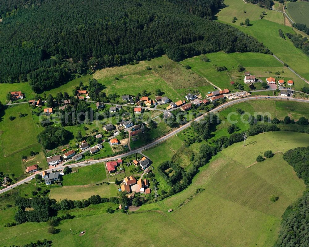 Unter-Mossau from the bird's eye view: Agricultural land and field boundaries surround the settlement area of the village in Unter-Mossau in the state Hesse, Germany