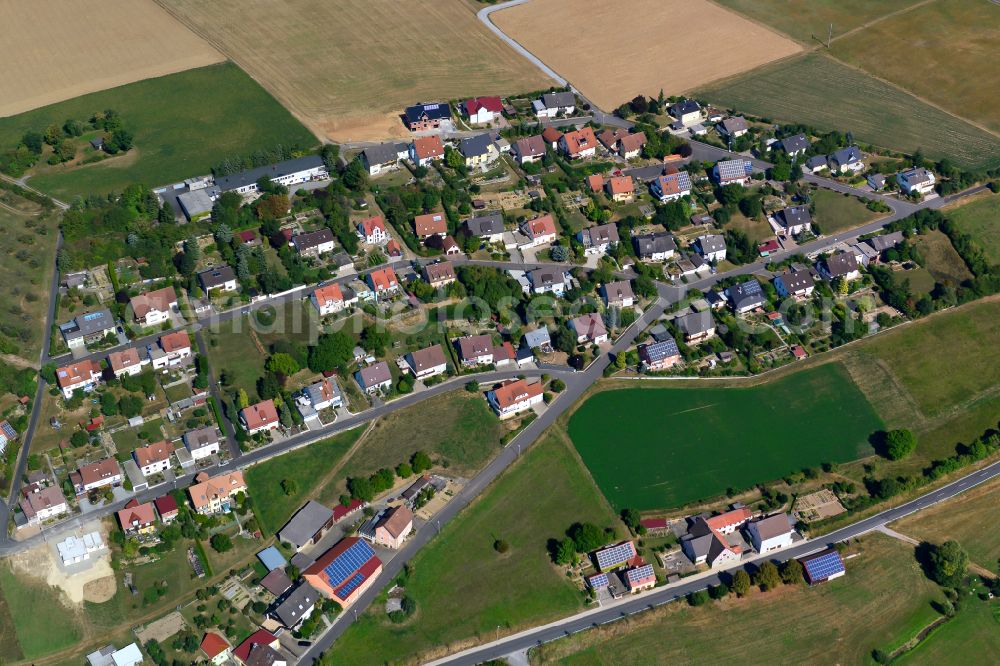 Aerial image Unteraltertheim - Agricultural land and field boundaries surround the settlement area of the village in Unteraltertheim in the state Bavaria, Germany