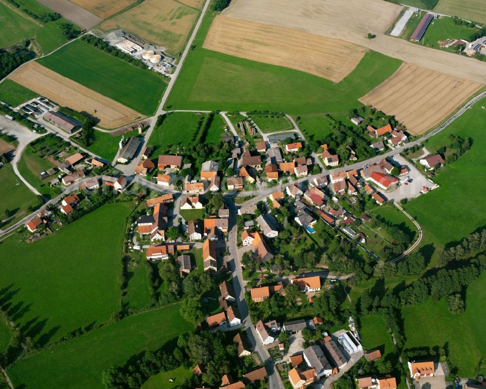 Unterampfrach from the bird's eye view: Agricultural land and field boundaries surround the settlement area of the village in Unterampfrach in the state Bavaria, Germany