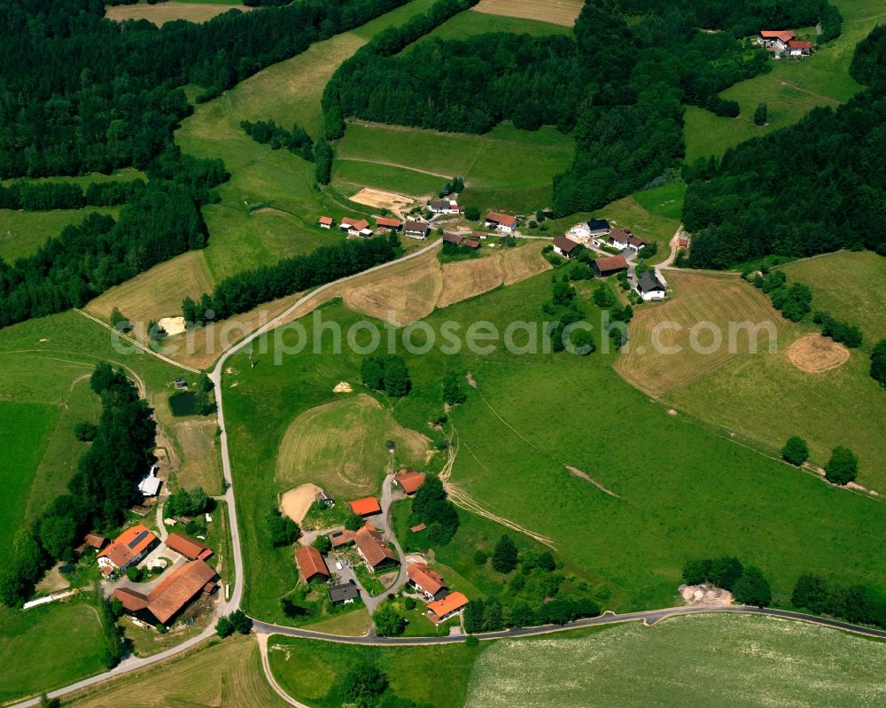 Aerial image Untergrub - Agricultural land and field boundaries surround the settlement area of the village in Untergrub in the state Bavaria, Germany