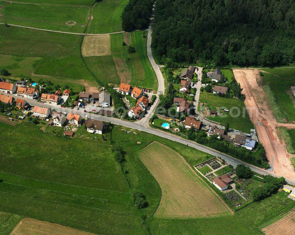 Aerial image Unterhaugstett - Agricultural land and field boundaries surround the settlement area of the village in Unterhaugstett in the state Baden-Wuerttemberg, Germany