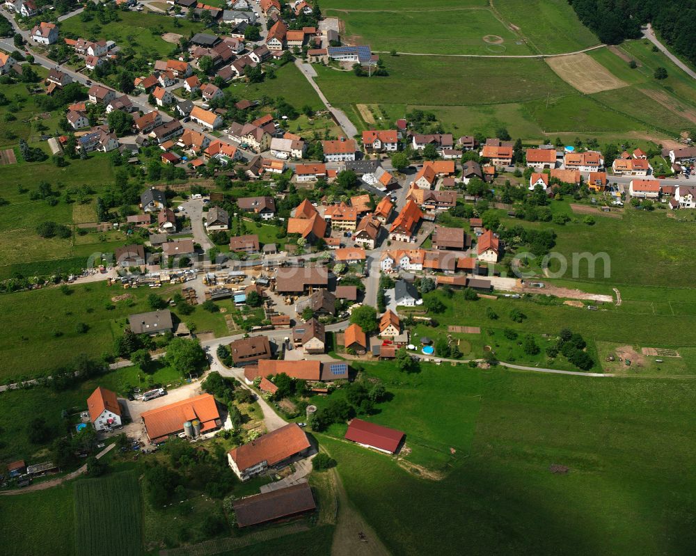 Aerial photograph Unterhaugstett - Agricultural land and field boundaries surround the settlement area of the village in Unterhaugstett in the state Baden-Wuerttemberg, Germany