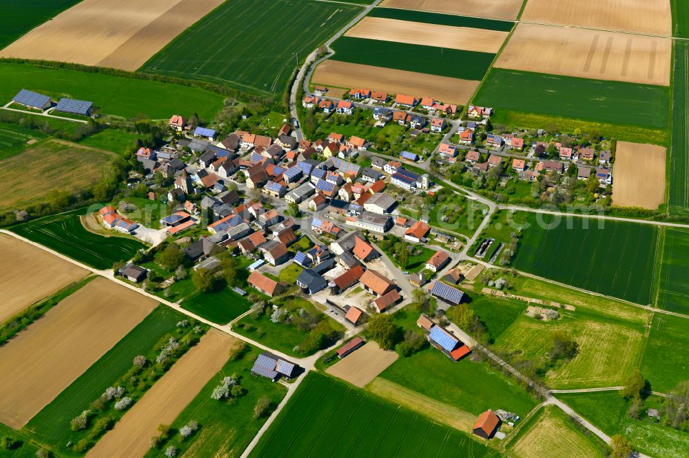 Aerial image Unterickelsheim - Agricultural land and field boundaries surround the settlement area of the village in Unterickelsheim in the state Bavaria, Germany