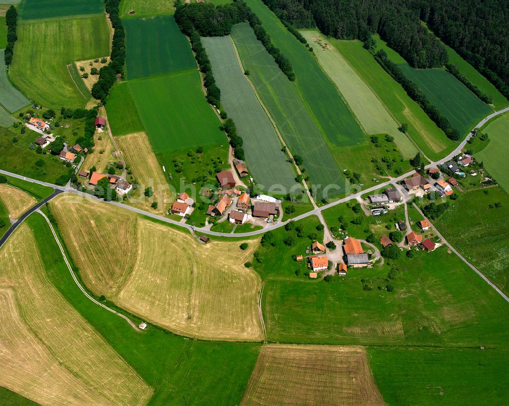 Unterkollbach from above - Agricultural land and field boundaries surround the settlement area of the village in Unterkollbach in the state Baden-Wuerttemberg, Germany