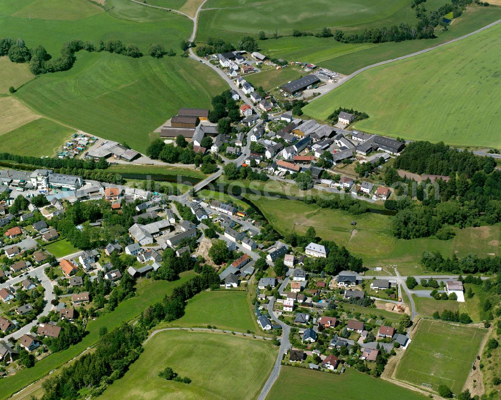 Aerial image Unterkotzau - Agricultural land and field boundaries surround the settlement area of the village in Unterkotzau in the state Bavaria, Germany