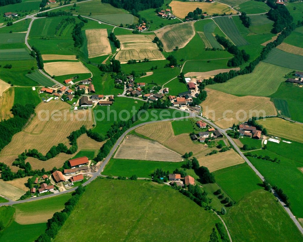 Aerial image Untermühlbach - Agricultural land and field boundaries surround the settlement area of the village in Untermühlbach in the state Bavaria, Germany