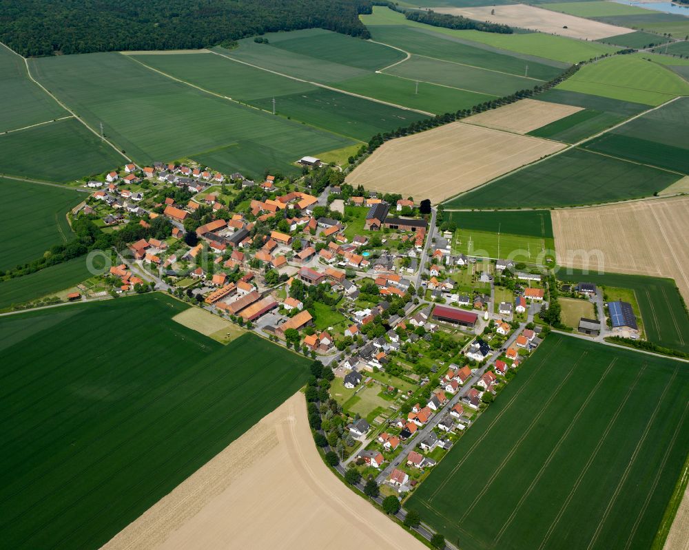 Aerial image Upen - Agricultural land and field boundaries surround the settlement area of the village in Upen in the state Lower Saxony, Germany