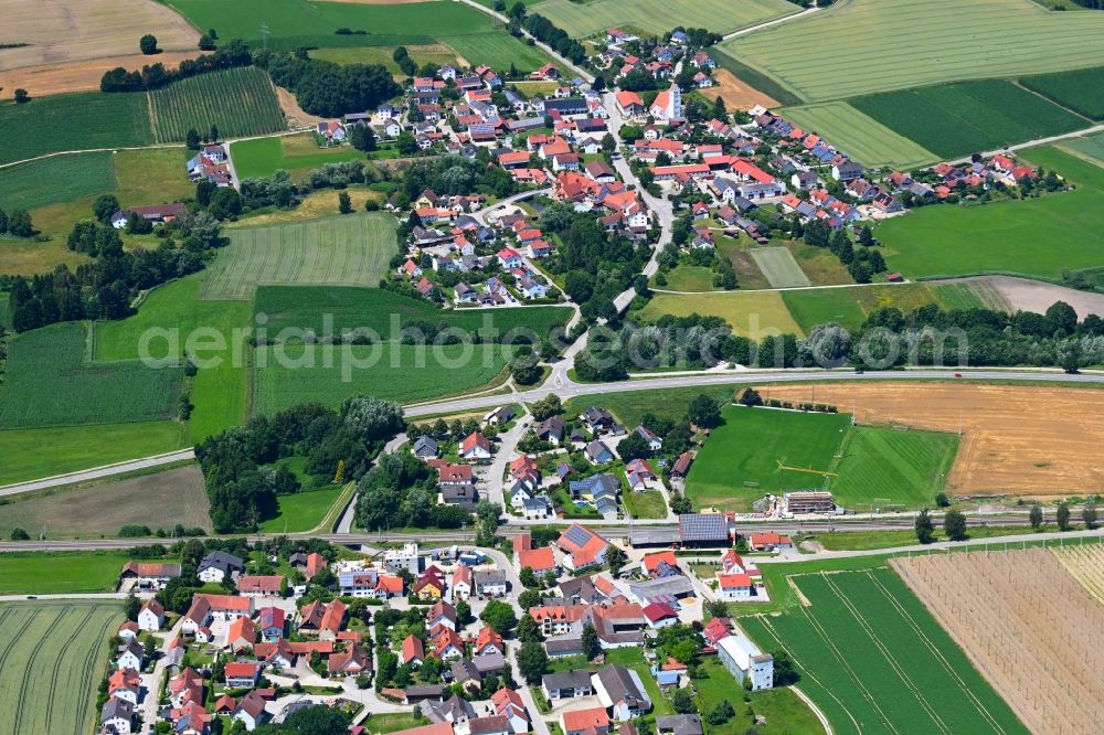 Aerial image Uttenhofen - Agricultural land and field boundaries surround the settlement area of the village in Uttenhofen in the state Bavaria, Germany