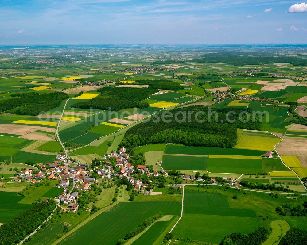 Aerial image Uttenweiler - Agricultural land and field boundaries surround the settlement area of the village in Uttenweiler in the state Baden-Wuerttemberg, Germany