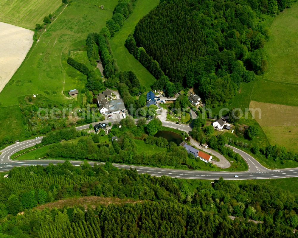 Aerial image Valbert - Agricultural land and field boundaries surround the settlement area of the village in Valbert in the state North Rhine-Westphalia, Germany