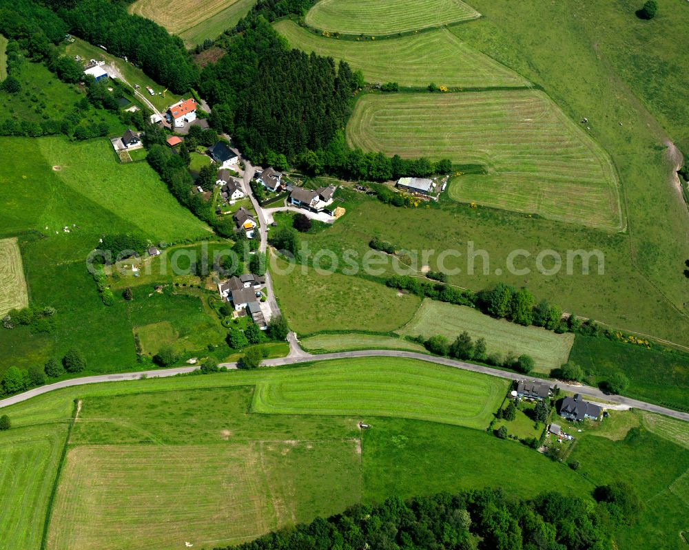 Aerial image Valbert - Agricultural land and field boundaries surround the settlement area of the village in Valbert in the state North Rhine-Westphalia, Germany