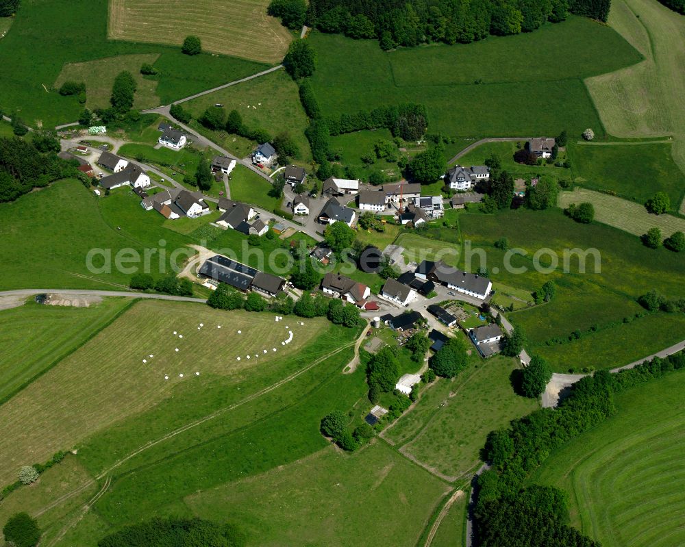 Aerial photograph Valbert - Agricultural land and field boundaries surround the settlement area of the village in Valbert in the state North Rhine-Westphalia, Germany