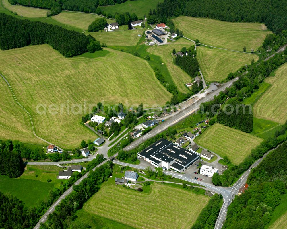 Aerial image Valbert - Agricultural land and field boundaries surround the settlement area of the village in Valbert in the state North Rhine-Westphalia, Germany