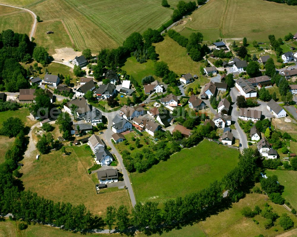 Aerial photograph Valbert - Agricultural land and field boundaries surround the settlement area of the village in Valbert in the state North Rhine-Westphalia, Germany