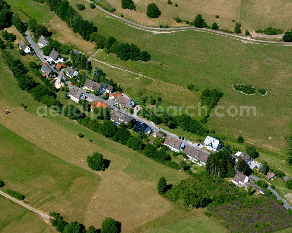 Aerial image Valbert - Agricultural land and field boundaries surround the settlement area of the village in Valbert in the state North Rhine-Westphalia, Germany