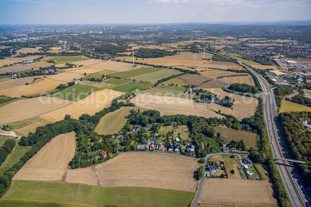 Vöckenberg from above - Agricultural land and field boundaries surround the settlement area of the village in Voeckenberg at Ruhrgebiet in the state North Rhine-Westphalia, Germany