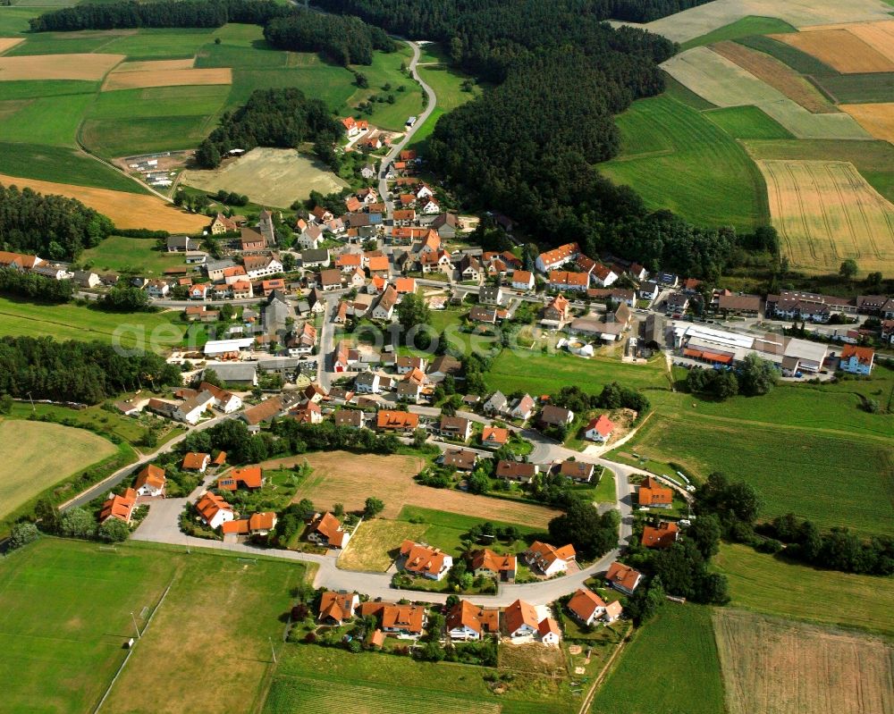 Aerial image Veitsaurach - Agricultural land and field boundaries surround the settlement area of the village in Veitsaurach in the state Bavaria, Germany