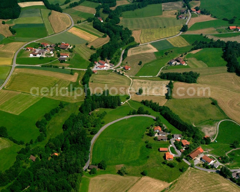 Velling from the bird's eye view: Agricultural land and field boundaries surround the settlement area of the village in Velling in the state Bavaria, Germany