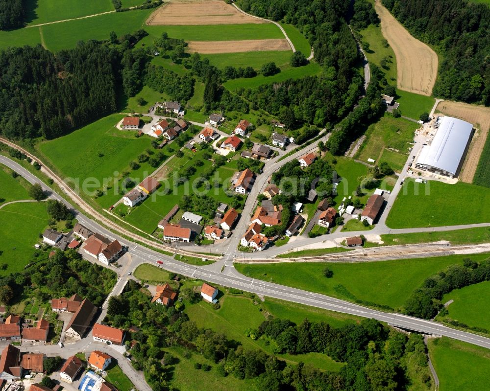 Veringendorf from above - Agricultural land and field boundaries surround the settlement area of the village in Veringendorf in the state Baden-Wuerttemberg, Germany