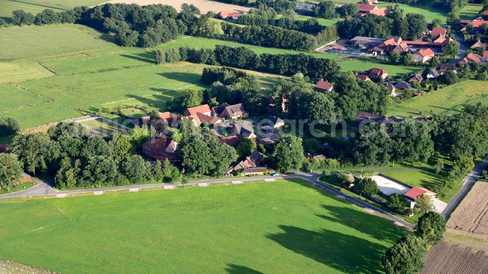 Aerial image Vethem - Agricultural land and field boundaries surround the settlement area of the village in Vethem in the state Lower Saxony, Germany