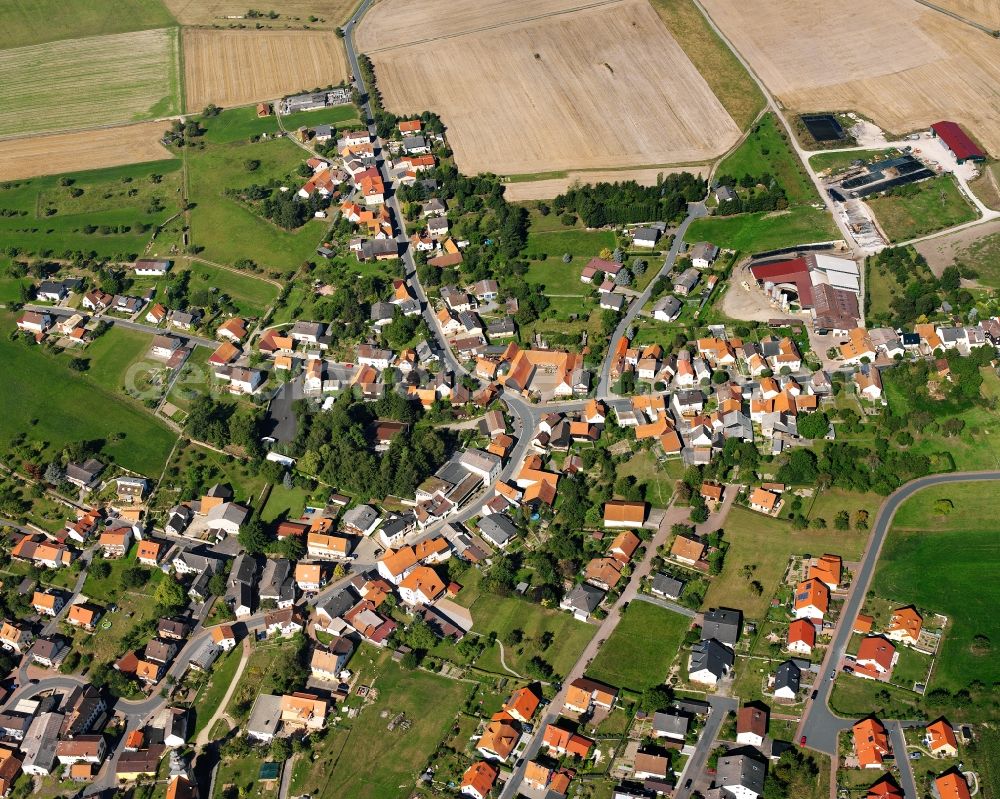 Aerial image Vielbrunn - Agricultural land and field boundaries surround the settlement area of the village in Vielbrunn in the state Hesse, Germany