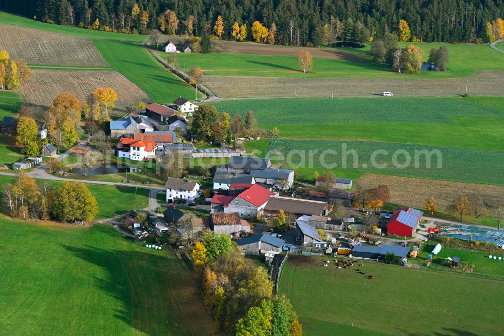 Vierst from above - Agricultural land and field boundaries surround the settlement area of the village in Vierst in the state Bavaria, Germany