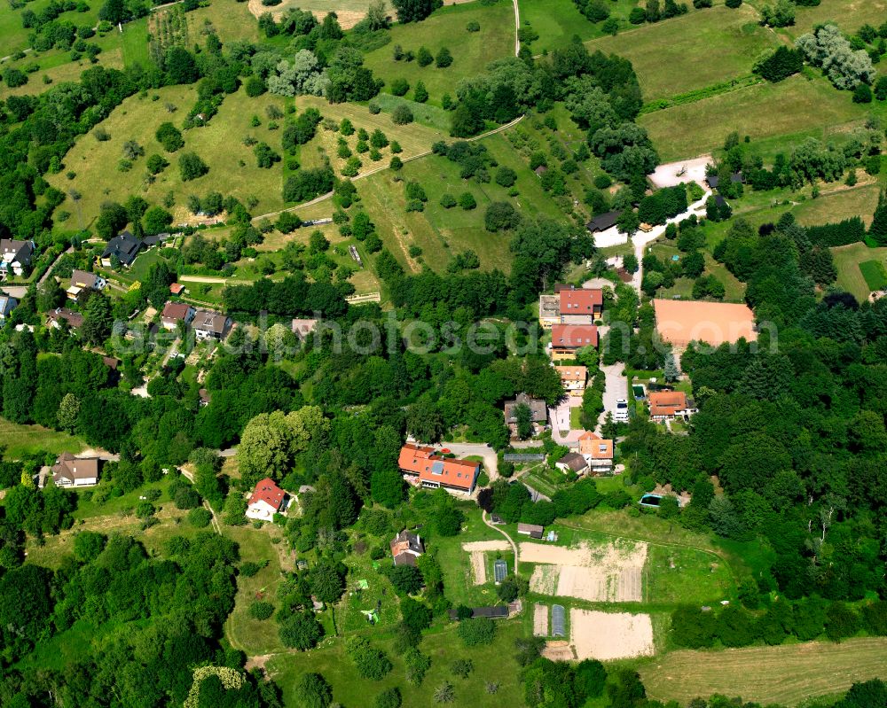 Aerial image Völkersbach - Agricultural land and field boundaries surround the settlement area of the village in Völkersbach in the state Baden-Wuerttemberg, Germany