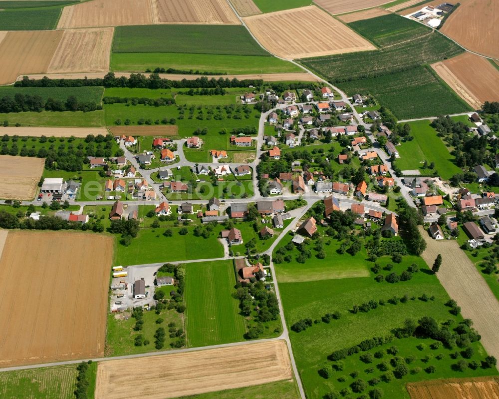 Aerial image Völlkofen - Agricultural land and field boundaries surround the settlement area of the village in Völlkofen in the state Baden-Wuerttemberg, Germany