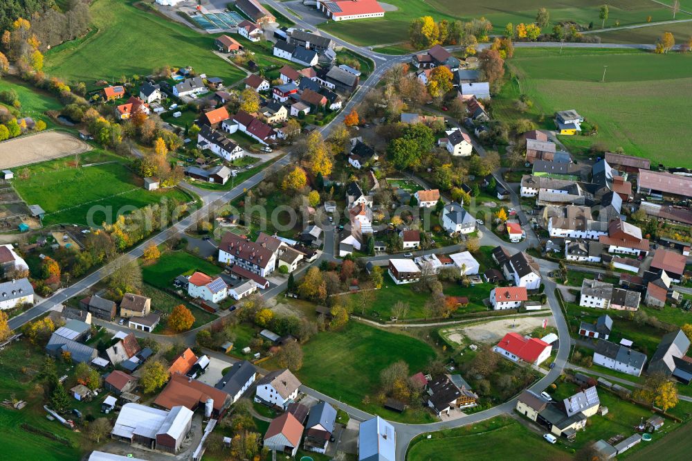 Vordorf from above - Agricultural land and field boundaries surround the settlement area of the village in Vordorf in the state Bavaria, Germany