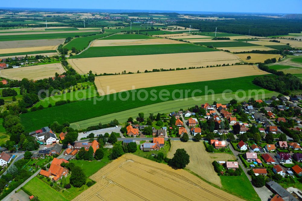 Aerial image Vornhagen - Agricultural land and field boundaries surround the settlement area of the village in Vornhagen in the state Lower Saxony, Germany