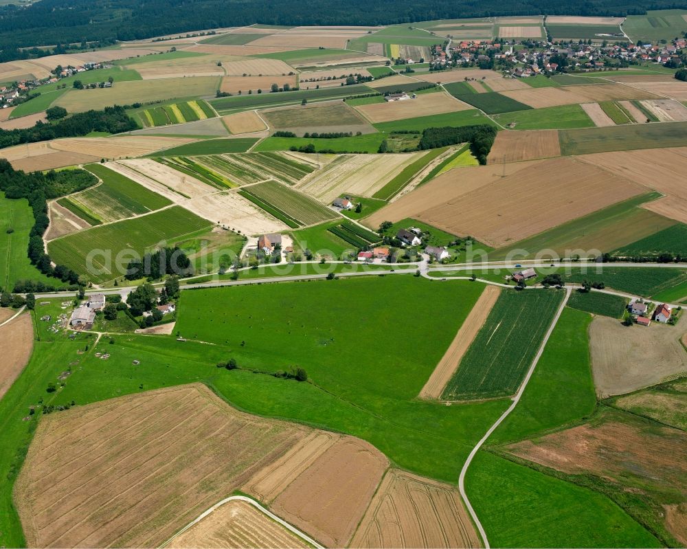 Wald from above - Agricultural land and field boundaries surround the settlement area of the village in Wald in the state Baden-Wuerttemberg, Germany