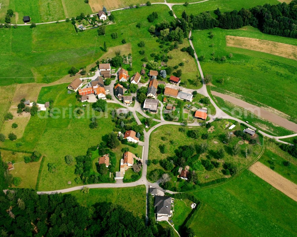 Walklensweiler from above - Agricultural land and field boundaries surround the settlement area of the village in Walklensweiler in the state Baden-Wuerttemberg, Germany