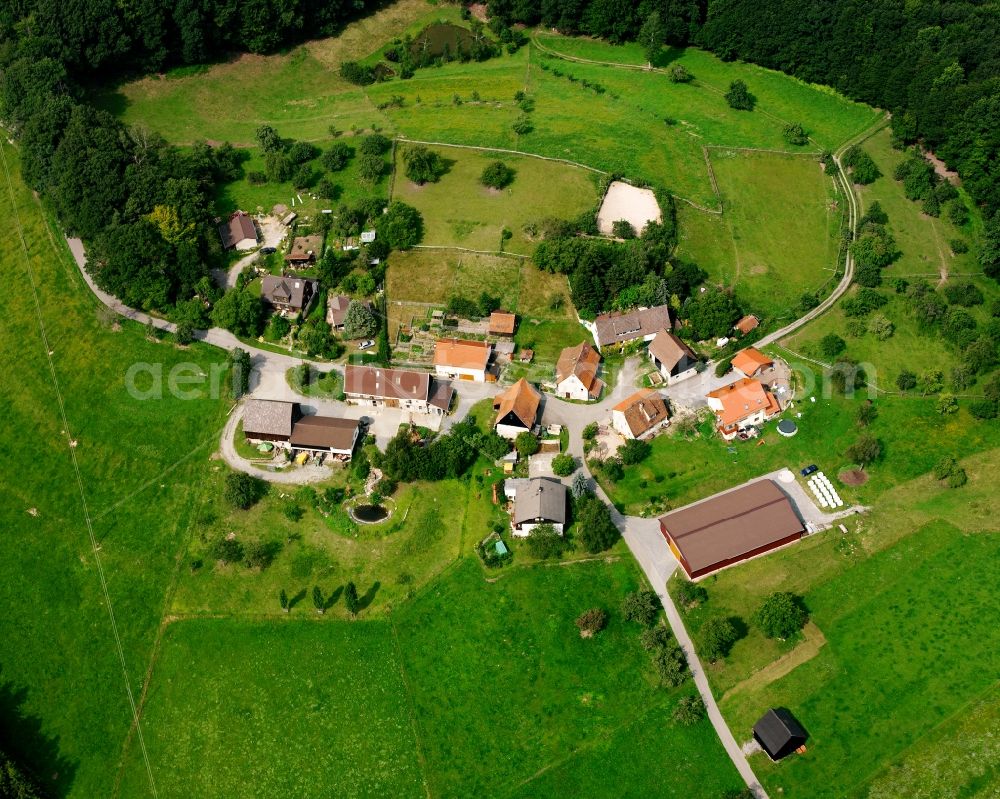 Walklensweiler from the bird's eye view: Agricultural land and field boundaries surround the settlement area of the village in Walklensweiler in the state Baden-Wuerttemberg, Germany