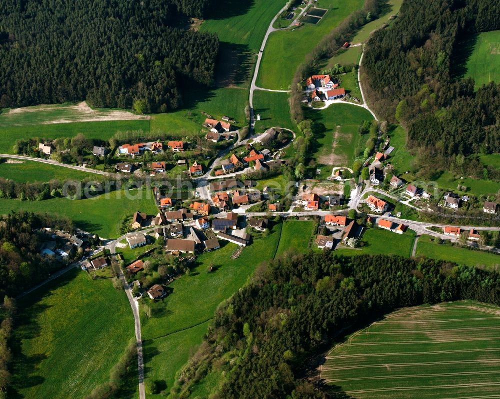 Aerial image Wallersdorf - Agricultural land and field boundaries surround the settlement area of the village in Wallersdorf in the state Bavaria, Germany