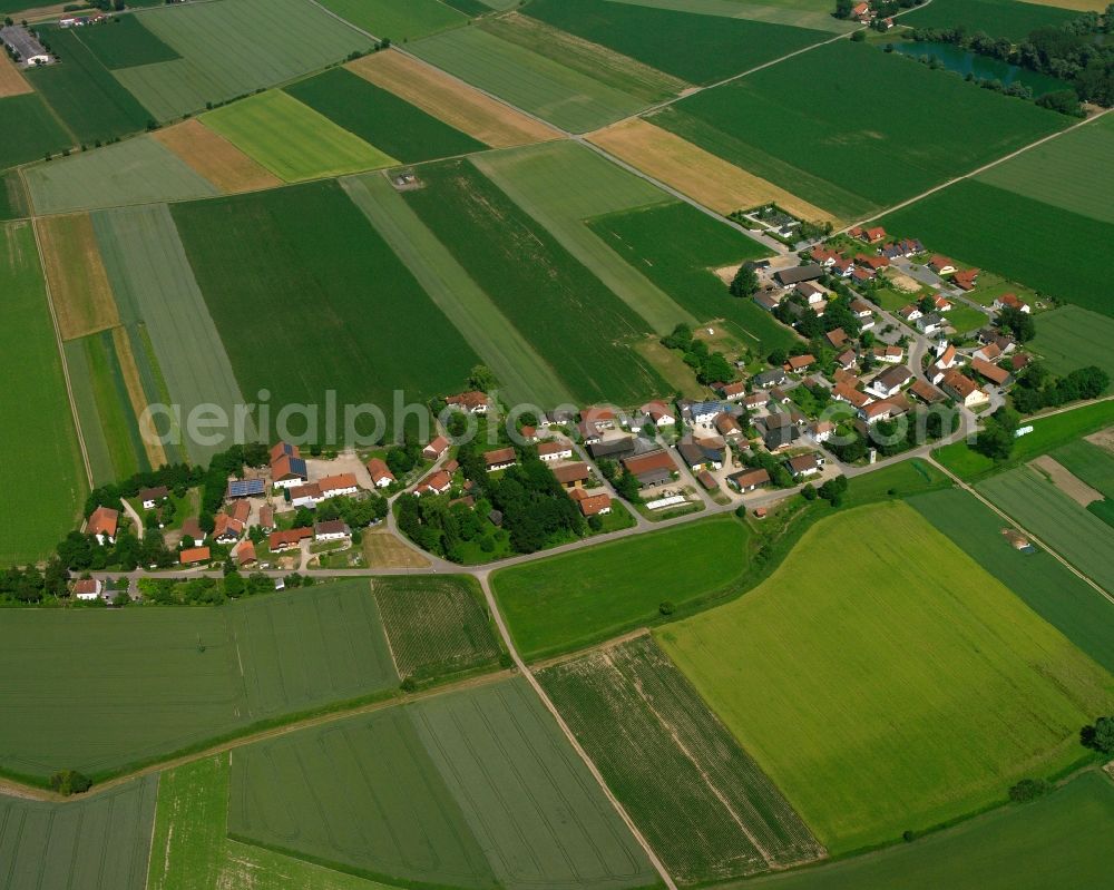 Waltendorf from above - Agricultural land and field boundaries surround the settlement area of the village in Waltendorf in the state Bavaria, Germany