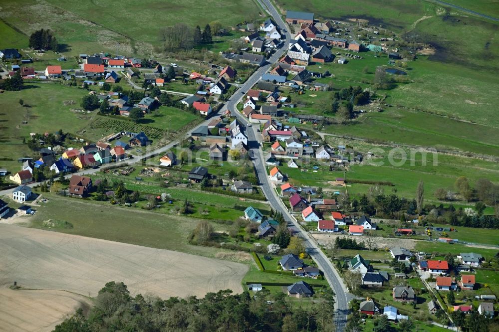 Warsin from the bird's eye view: Agricultural land and field boundaries surround the settlement area of the village in Warsin in the state Mecklenburg - Western Pomerania, Germany