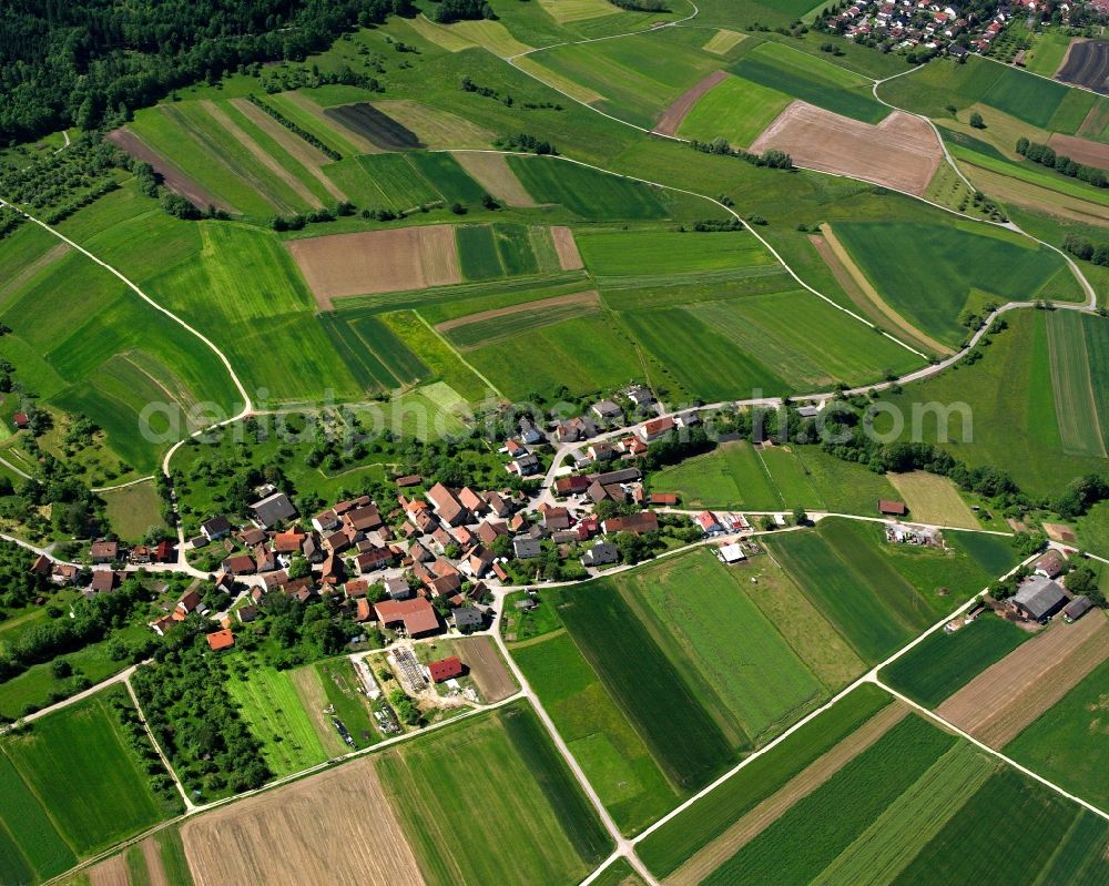 Wattenweiler from the bird's eye view: Agricultural land and field boundaries surround the settlement area of the village in Wattenweiler in the state Baden-Wuerttemberg, Germany