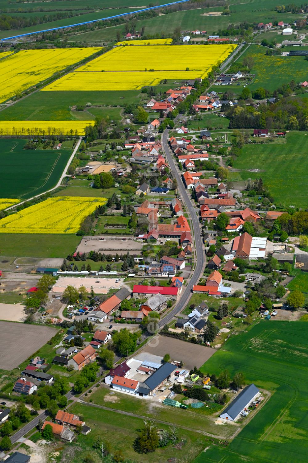 Aerial photograph Weddendorf - Agricultural land and field boundaries surround the settlement area of the village in Weddendorf in the state Saxony-Anhalt, Germany