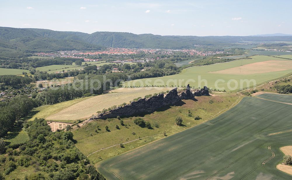 Weddersleben from above - Agricultural land and field boundaries surround the settlement area of the village in Weddersleben in the state Saxony-Anhalt, Germany