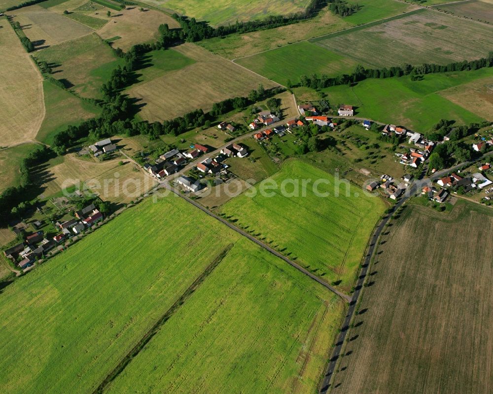 Aerial image Weiden - Agricultural land and field boundaries surround the settlement area of the village in Weiden in the state Saxony-Anhalt, Germany