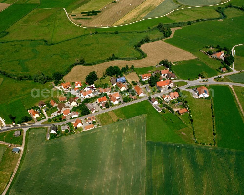 Aerial image Weidendorf - Agricultural land and field boundaries surround the settlement area of the village in Weidendorf in the state Bavaria, Germany