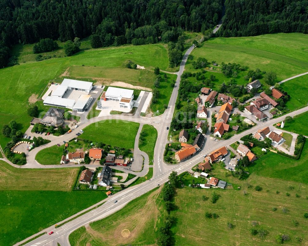 Weihenbronn from above - Agricultural land and field boundaries surround the settlement area of the village in Weihenbronn in the state Baden-Wuerttemberg, Germany