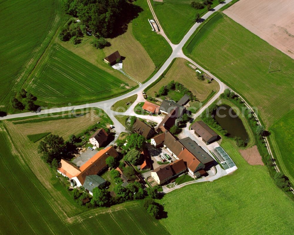 Aerial photograph Weiler a See - Agricultural land and field boundaries surround the settlement area of the village in Weiler a See in the state Bavaria, Germany