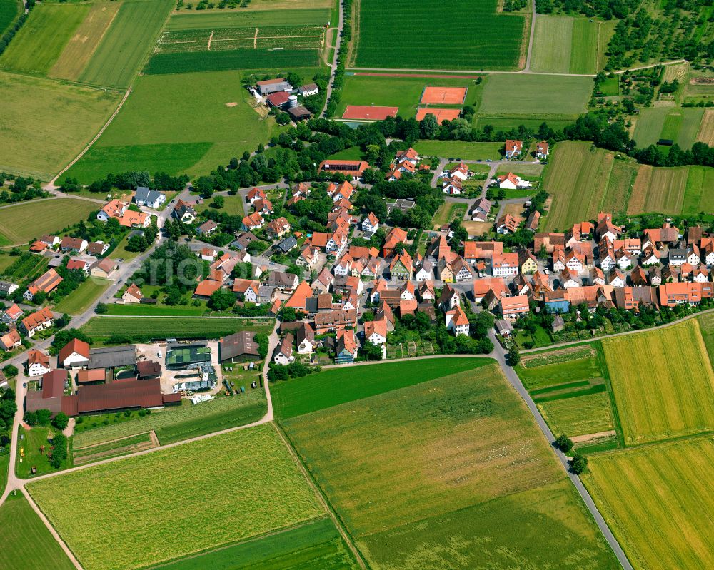 Weilheim from the bird's eye view: Agricultural land and field boundaries surround the settlement area of the village in Weilheim in the state Baden-Wuerttemberg, Germany