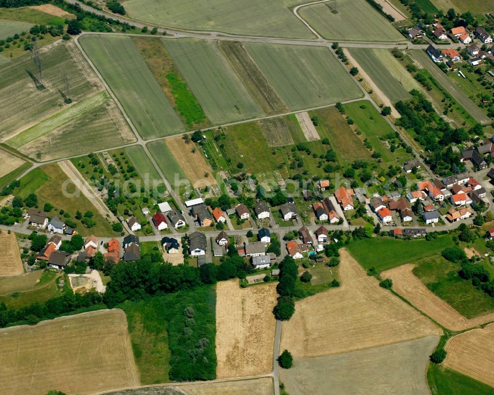 Weitenung from the bird's eye view: Agricultural land and field boundaries surround the settlement area of the village in Weitenung in the state Baden-Wuerttemberg, Germany