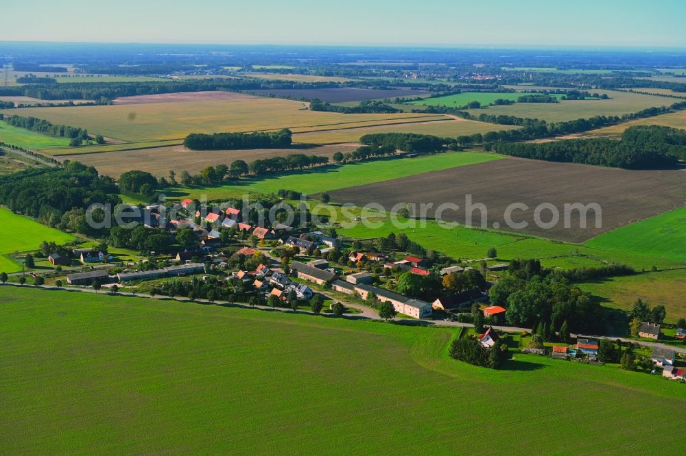 Aerial photograph Weitgendorf - Agricultural land and field boundaries surround the settlement area of the village in Weitgendorf in the state Brandenburg, Germany