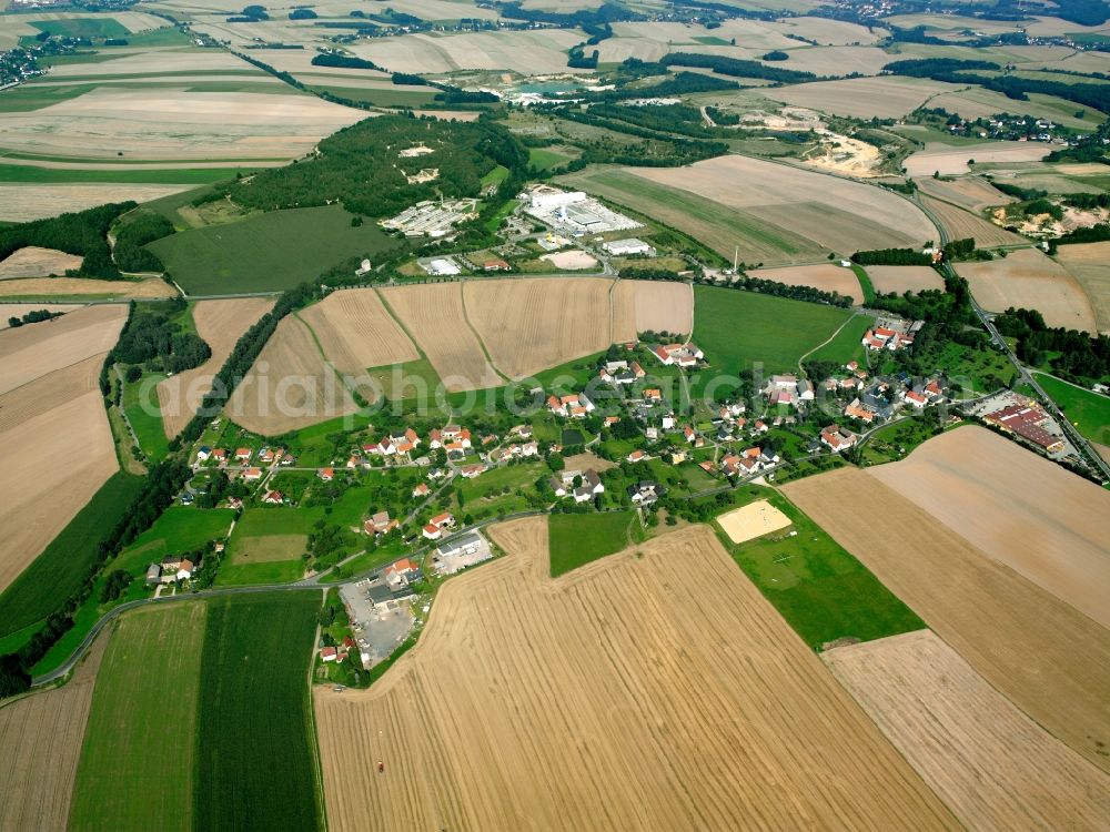 Aerial image Wernsdorf - Agricultural land and field boundaries surround the settlement area of the village in Wernsdorf in the state Saxony, Germany